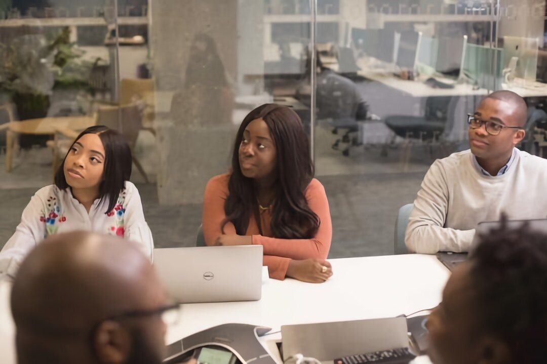 diverse group discussing technology